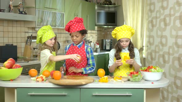 Children Cooking at Kitchen Table.