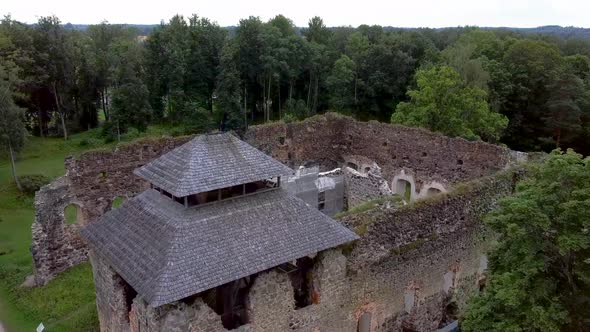 Medieval Castle Ruins in Latvia Rauna.  Aerial View Over Old Stoune Brick Wall of Raunas Castle 