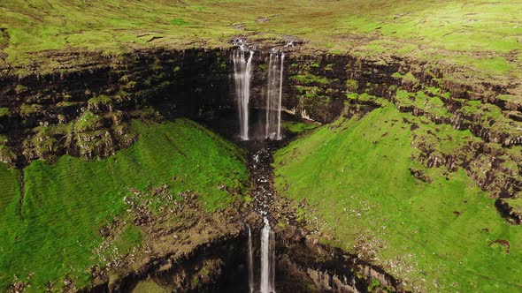 Aerial View of Stunning Waterfall in Faroe Islands. Aerial View of Fossa Waterfall. Cloudy Weather