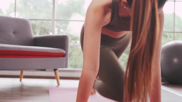 Young Asian woman exercise every morning to stay healthy.