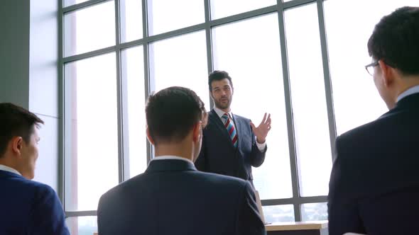 Group of Business People Meeting in a Seminar Conference