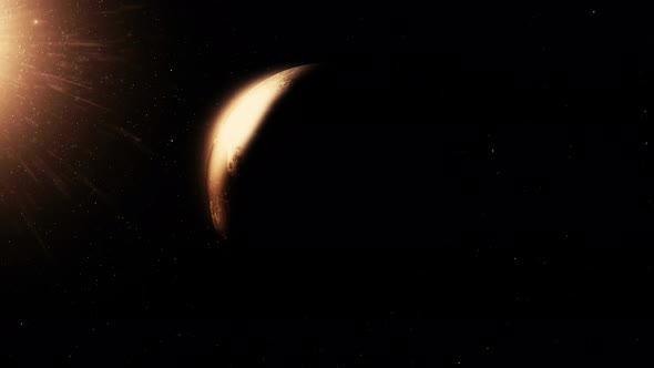 Lonely far planet rotates in deep dark space with sun reflection