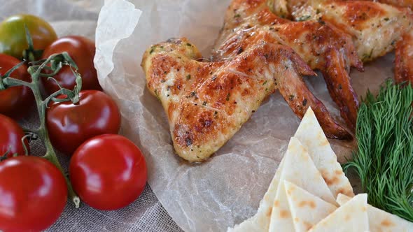 Grilled Chicken Wings with Sauces and Vegetables