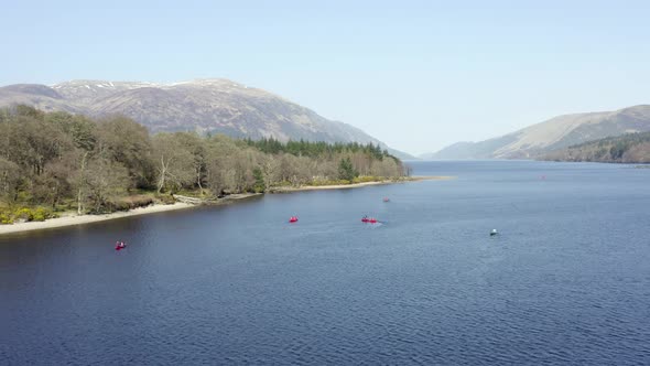 Canoeists in Scotland in a Lake by Beautiful Landscape From the Air