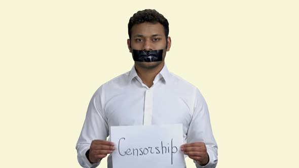 Indian Man Silenced with Black Tape on Mouth
