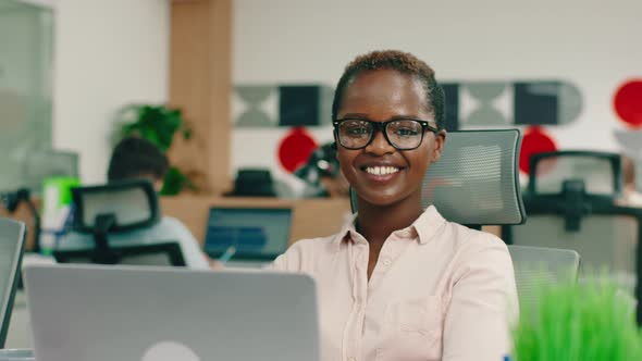 An Intelligent Looking African Woman with Short