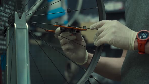 Wheel Straightening Stand in Bicycle Workshop