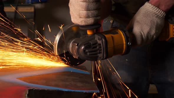 grinder cuts metal