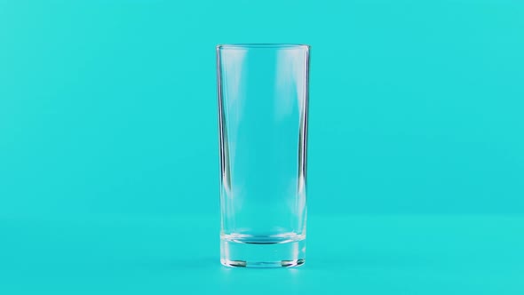  Close-up Shot of Milk Cold Beverage Drink Pooring Into Low Glass Blue Background in Studio