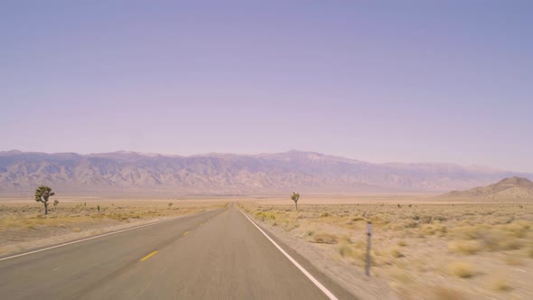 POV Driving Eastern California Desert on Clear Day Road Trip