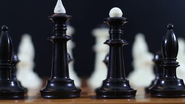 Menacing Black Pieces On A Chessboard