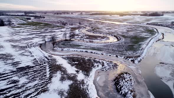 Aerial view of frozen river in winter