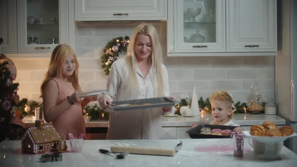 Family Christmas Tired Mother and Her Children Finished Making Cookies and Donuts for the Holiday