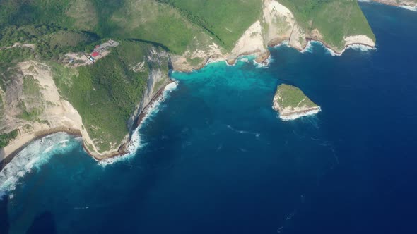 Aerial View of Beautiful Cliffs Overgrown with Green on Kelingking Beach