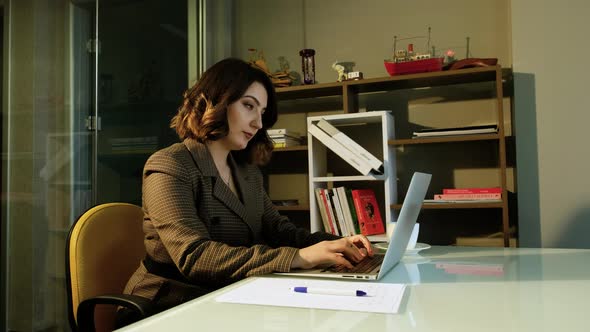 Beautiful Woman, Office Worker Using Laptop at Office. Female Freelance, Manager. alt