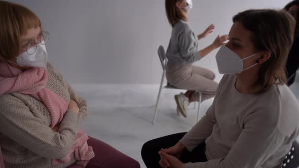 Women of Different Ages Wearing Masks Meet at a Therapeutic Psychological Group During the