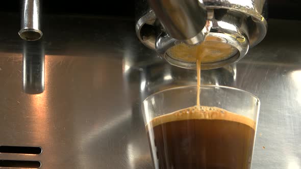 Espresso Pours From Coffee Machine.