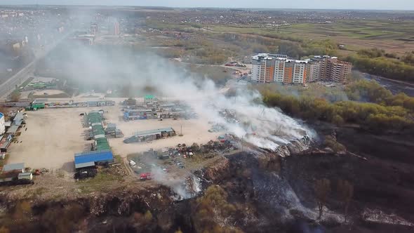 Aerial View of Wildfire Spreading Flames of Forest Fire