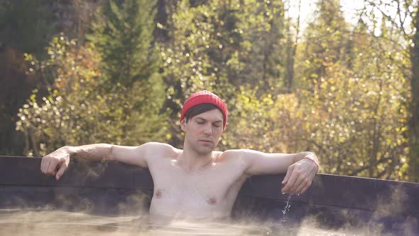 Young Man Enjoy Spending Time in Bath Outdoors