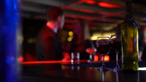 Couple Dancing in Club After Having Glass of Wine Together, Casual Acquaintances