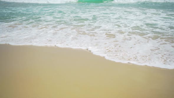 Sea water and foam for sunny day on the beach