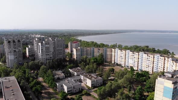 Aerial Panorama of Dwelling Blocks of Multistory Buildings Near Nature and River