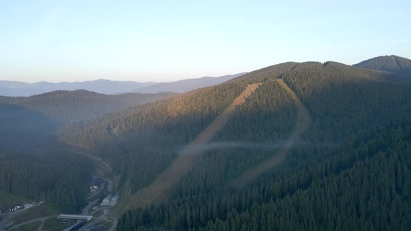 Aerial View of Sunrise Above Bukovel Ski Resort at Summertime