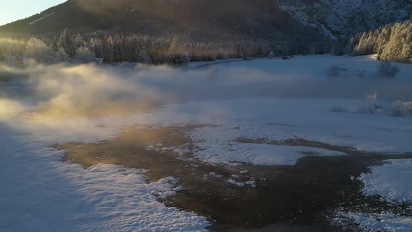 Beautiful winter morning with fresh snow and fog