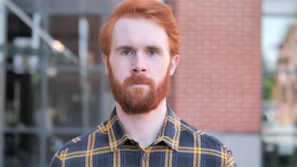 Outdoor Portrait of Redhead Mature Man