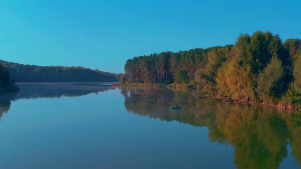 Lonely Fisherman on a Boat