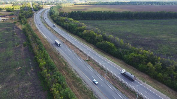 Asphalt straight road with Traffic cars driving