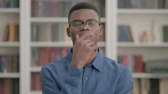 Pensive Young African Man Thinking New Idea