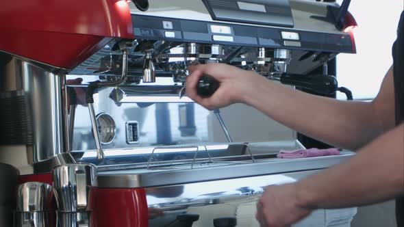 Barista Using Coffee Machine Preparing Fresh Coffee