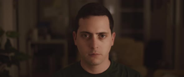 Close up Of a Young Man with Eyes Wide Open Looking to The Camera