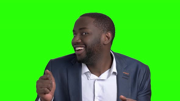 Funny Afro-american Businessman on Green Screen.