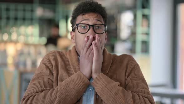 Portrait African Man Having Loss While Using Laptop