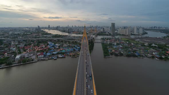 Time lapse of aerial view of Bhumibol Bridge and Chao Phraya River in structure