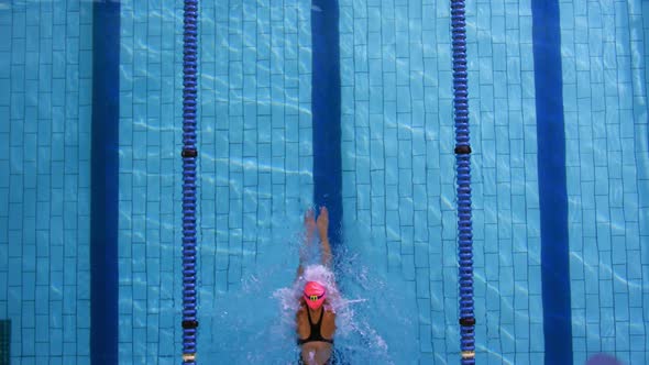 Swimmer training in a swimming pool