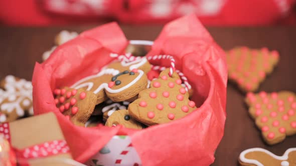 Time lapse. Packaging traditional home made gingerbread cookies as food gifts.