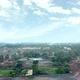 Drone moves from Dry Land to Greenery on a cloudy day in India - VideoHive Item for Sale