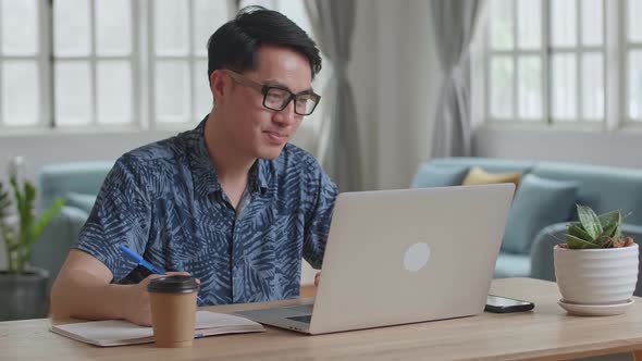 Man Having Video Call At Home