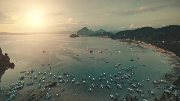 Sunset at Tropical Ocean Aerial Boats Ships Yachts at Blue Waterfront