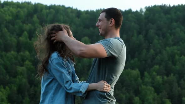 A Man Ruffling His Girlfriend's Hair. Young Couple Having Fun