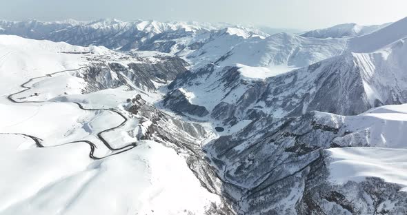 Aerial view of beautiful snowy mountains in Gudauri, Georgia