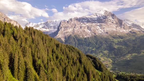 Hyperlapse of dynamic clouds moving over Eiger mountain top in Swiss Alps