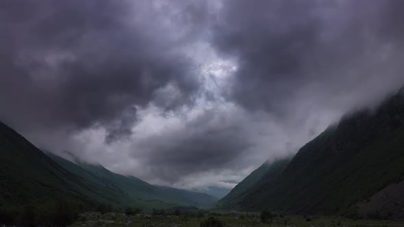 Fast Moving Dramatic Clouds in Mountains