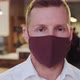 Doctor Video Footage - A Man Wearing Maroon Face Mask While Looking At The Camera - VideoHive Item for Sale