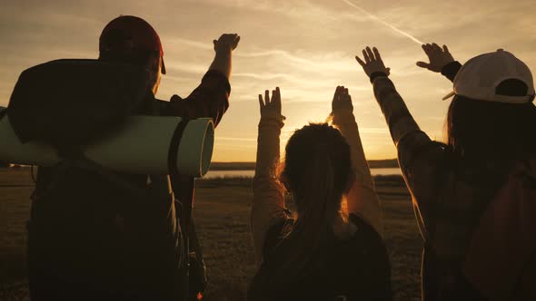 Silhouette of Family at the Coast