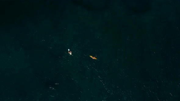 Birds Eye on Surfers Waiting Wave on Lineup