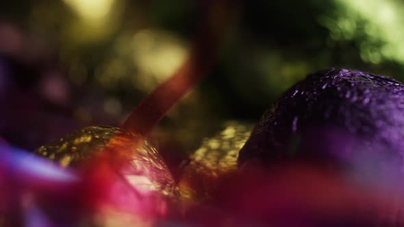 Rotating shot of colorful Easter candies on a bed of easter grass - EASTER 255